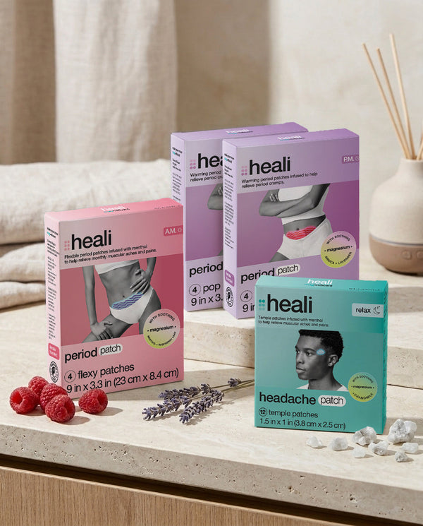 The Period Relief Combo: one Cooling A.M. box, two Warming P.M. boxes and a Relax Headache Patch box with raspberries and lavender